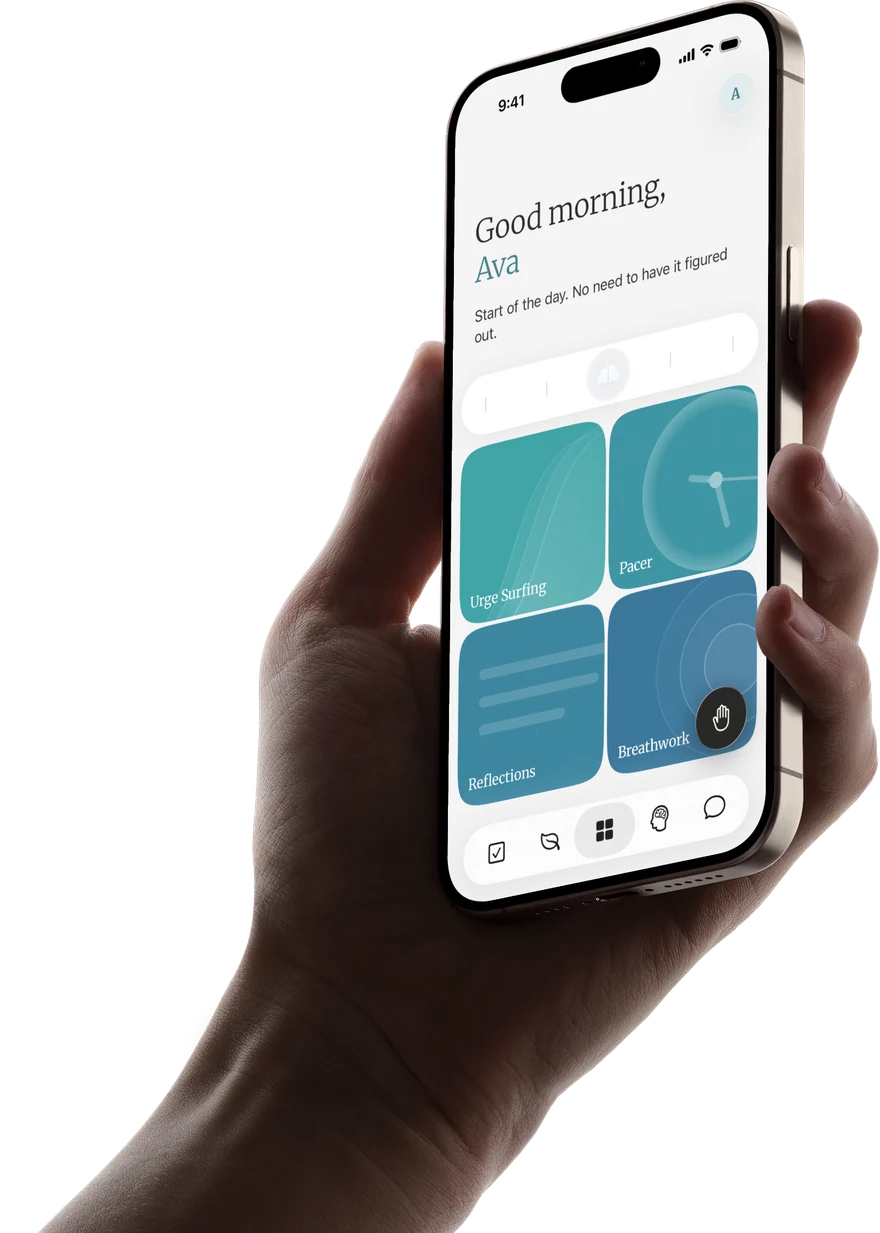 A hand holding an iPhone showing the Maureen Care home screen